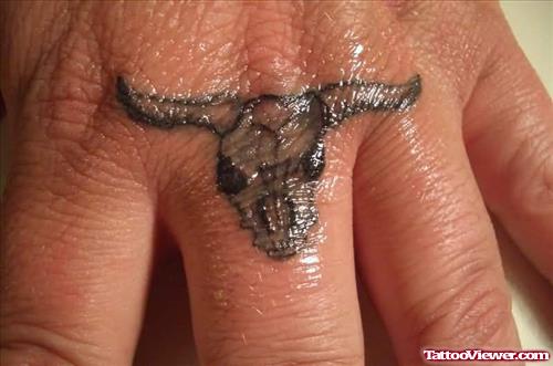 Bull Tattoo On Finger