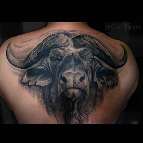 Wonderful Angry Bull Tattoo On Upper Back