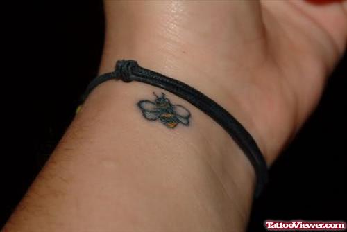 Cute Tiny Bumblebee Tattoo On Wrist