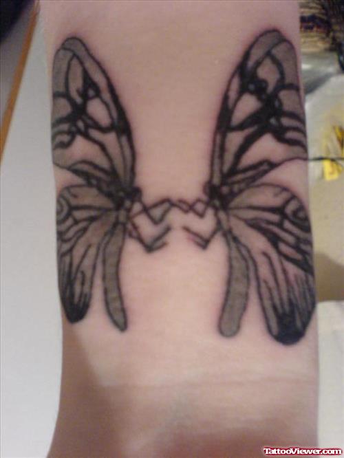 Grey Ink Butterfly On Wrists