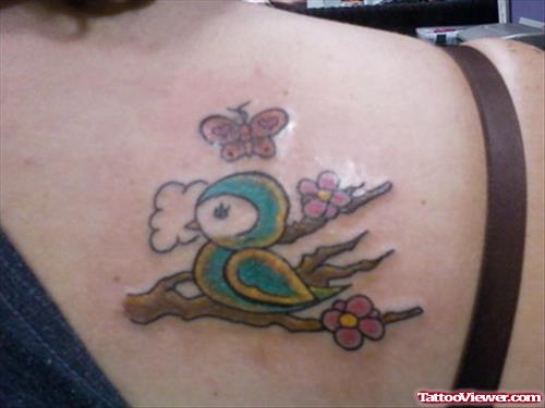 Flower With Bird and Butterfly Tattoo On Back Shoulder