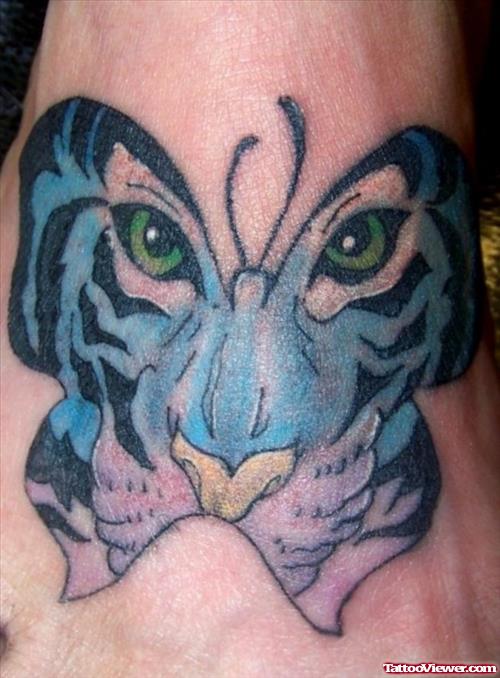 Colored Tiger Face Butterfly Tattoo On Foot