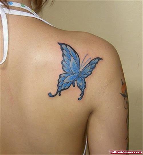 Blue Ink Butterfly Tattoo On Right Back Shoulder