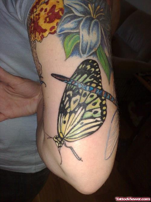 Blue Flower And Butterfly Tattoo On Right Half Sleeve