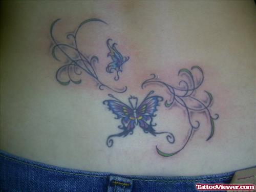 Colored Ink Butterfly Tattoo On Lowerback