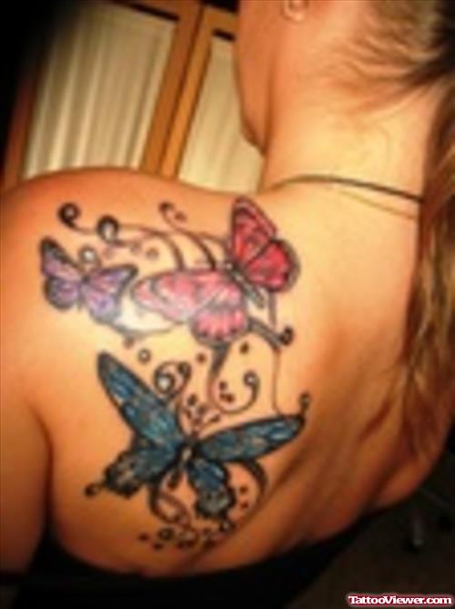 Blue and Red Butterflies Tattoos On Left Back Shoulder