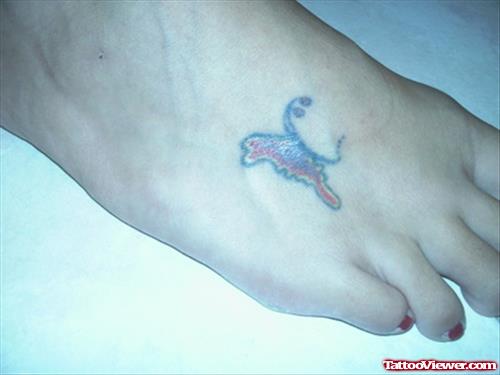 Colored Butterfly Tattoo On Girl Right Foot