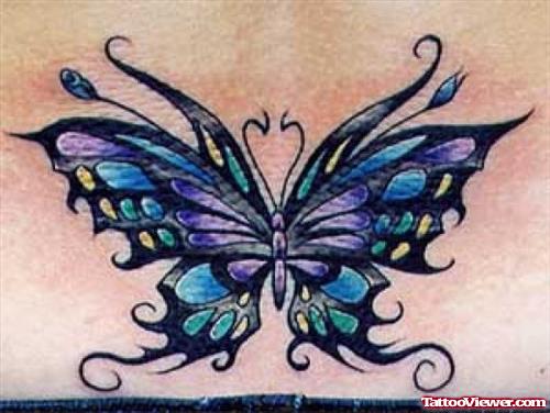 Wonderful Colored Ink Butterfly Tattoo On Lowerback
