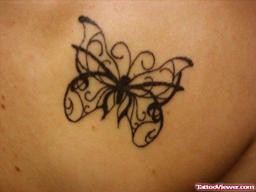 Outline Butterfly Tattoo On Back Shoulder