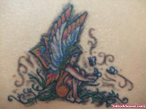 Colored Fairy With Butterflies Tattoo