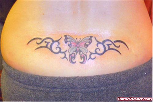 Black Tribal And Butterfly Tattoo On Lowerback