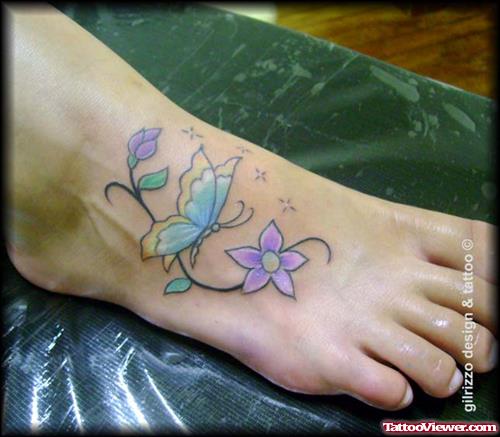 Blue Butterfly And Flower Tattoo On Right Foot