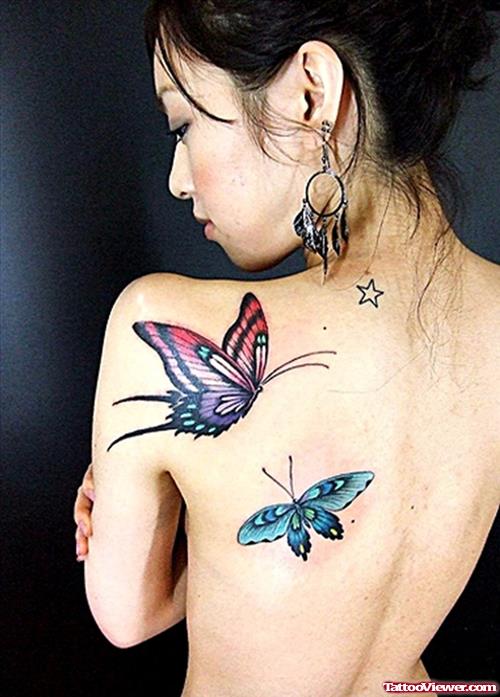 Red And Blue Ink Butterfly Tattoos On Back