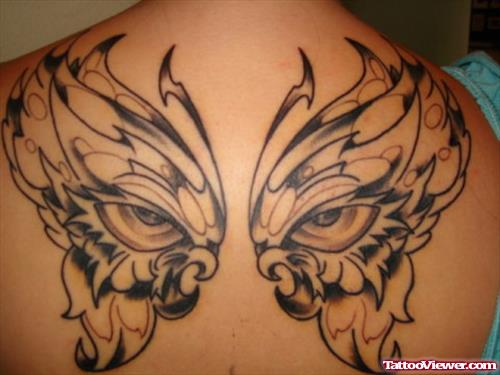 Grey Ink Eyes Wings Butterfly Tattoo on Back