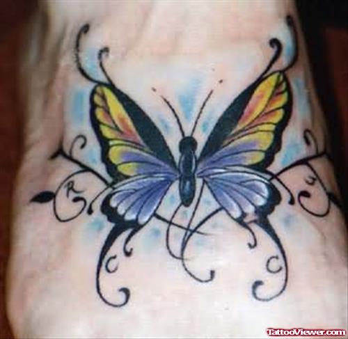 Colored Butterfly Tattoo On Right Foot