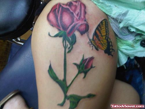 Rose Flower And Butterfly Tattoo On Right Thigh
