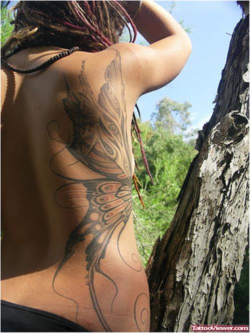 Rib Butterfly Tattoo