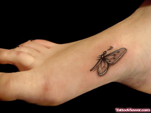 Grey Ink Butterfly Tattoo On Foot