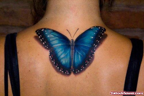 Blue Ink Butterfly Tattoo On Upperback