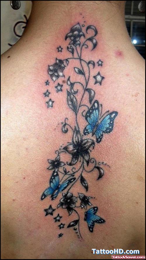 Stars And Blue Ink Butterflies Tattoo On Back