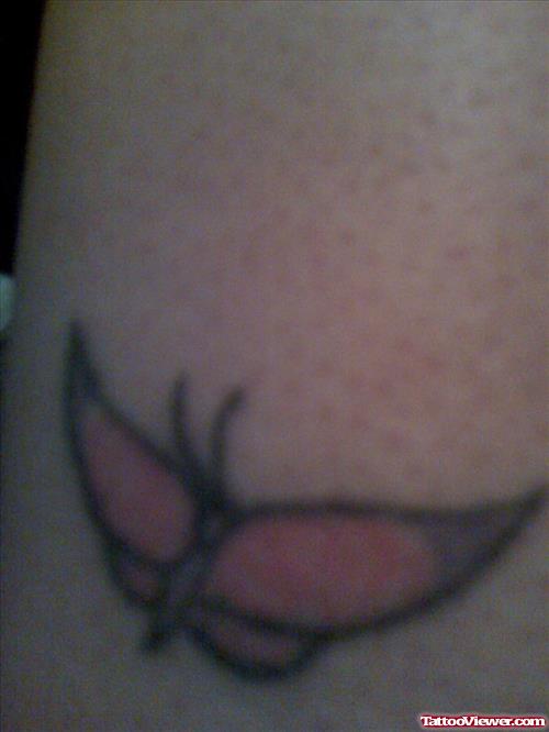 Small Pink Butterfly Tattoo