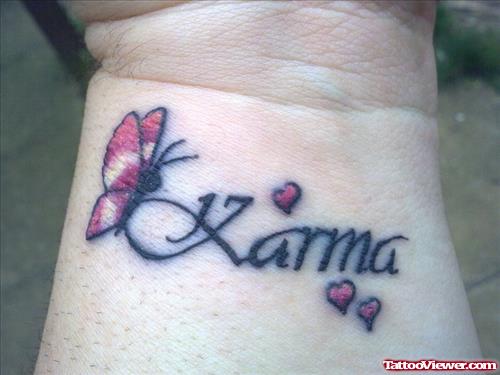 Karma Nape And Butterfly Tattoo On Wrists
