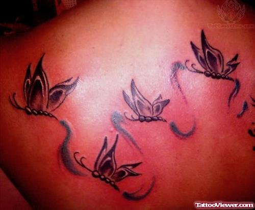 Flying Butterflies Tattoos On Upperback