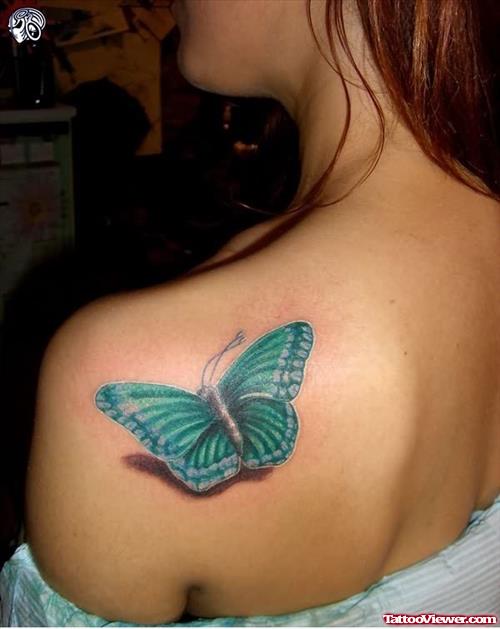 Light Blue Butterfly Tattoo On Shoulder