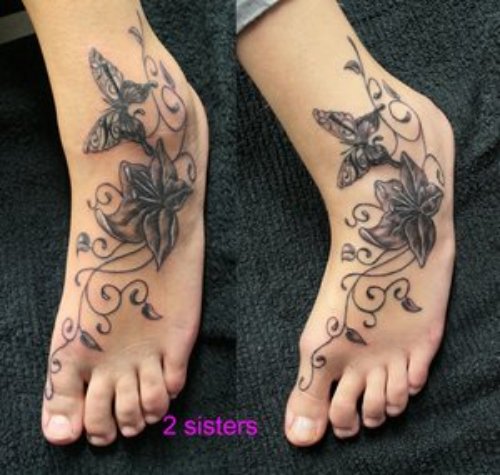 Grey Ink Flower And Butterfly Tattoo On Left Foot