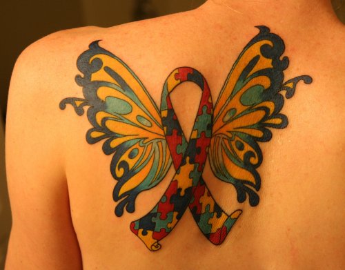 Colored Ribbon Butterfly Tattoo On Back Shoulder