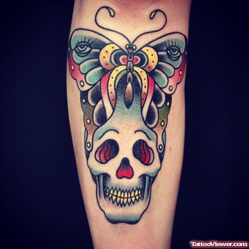 colored skull with butterfly tattoo