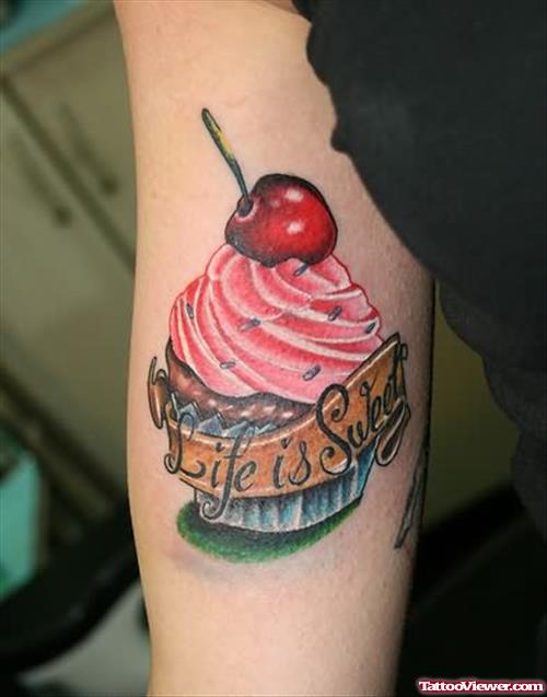 Strawbery Cake Tattoo On Muscles