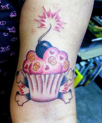 Cake Bomb Tattoo On Muscles