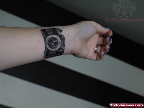 Camera Tattoo On Left Forearm