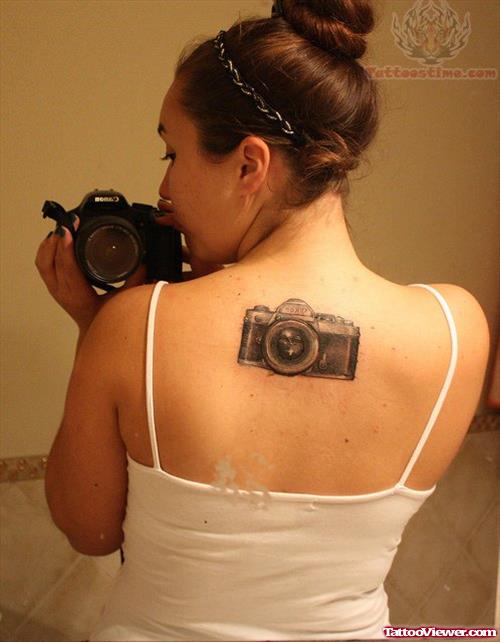 Camera Tattoo On Girl Back