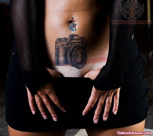 Camera Tattoo And Belly Piercing