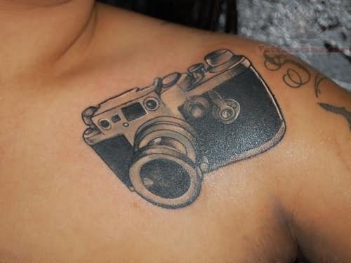 Camera Tattoo On Girl Collarbone
