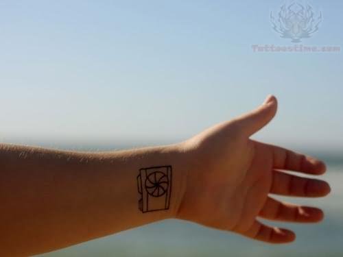 Camera Tattoo On Left Wrist