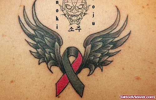 Winged Ribbon Cancer Tattoo