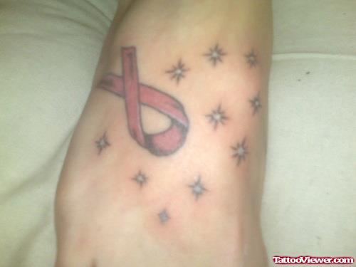 Twinkling Stars And Breast Cancer Tattoo On Foot
