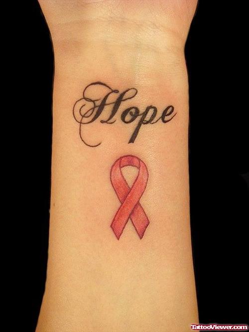 Hope And Pink Ribbon Cancer Tattoo On Left Forearm