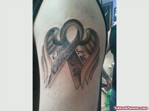 Grey Ink Winged Ribbon Cancer Tattoo On Half Sleeve