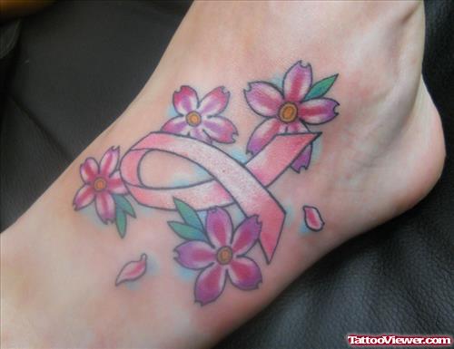 Flowers And Ribbon Cancer Tattoo On Left Foot