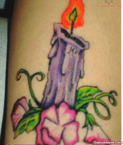 Flower And Candle Tattoo