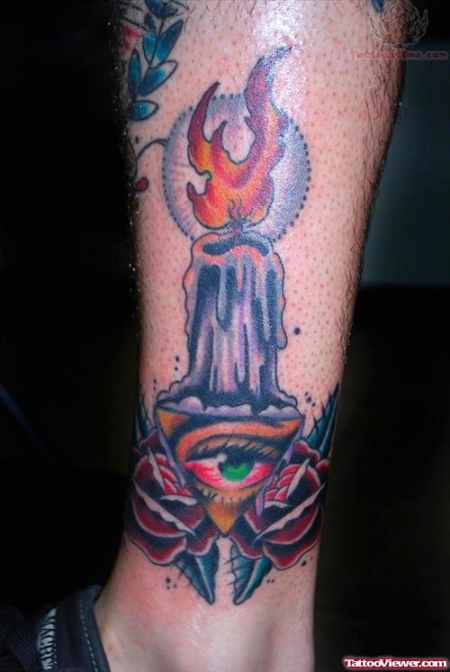Eye And Candle Tattoo On Leg
