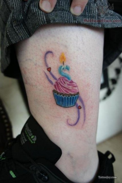 Cupcake And Candle Tattoo On Leg