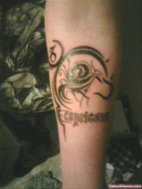 Tribal And Capricorn Tattoo On Sleeve