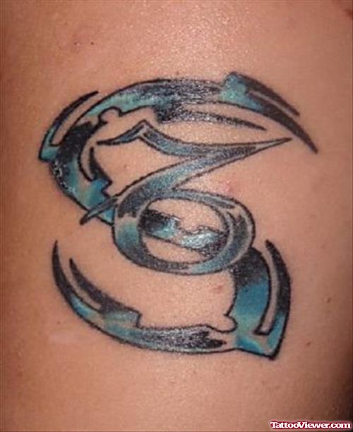 Black And Blue Ink Tribal Capricorn Sign Tattoo