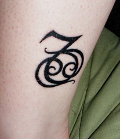 Black Ink Tribal Capricorn Tattoo