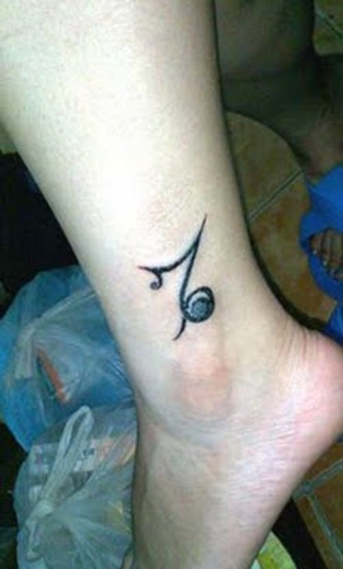 Capricorn Zodiac Tattoo On Left Leg